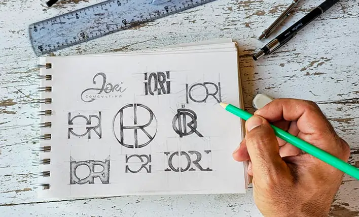 Hand-drawn logo sketches used during the Pixel Shake design process.