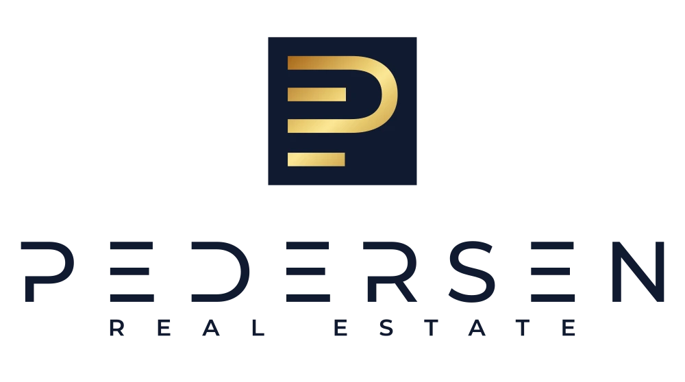 Pedersen Real Estate logo in midnight blue and gold on white